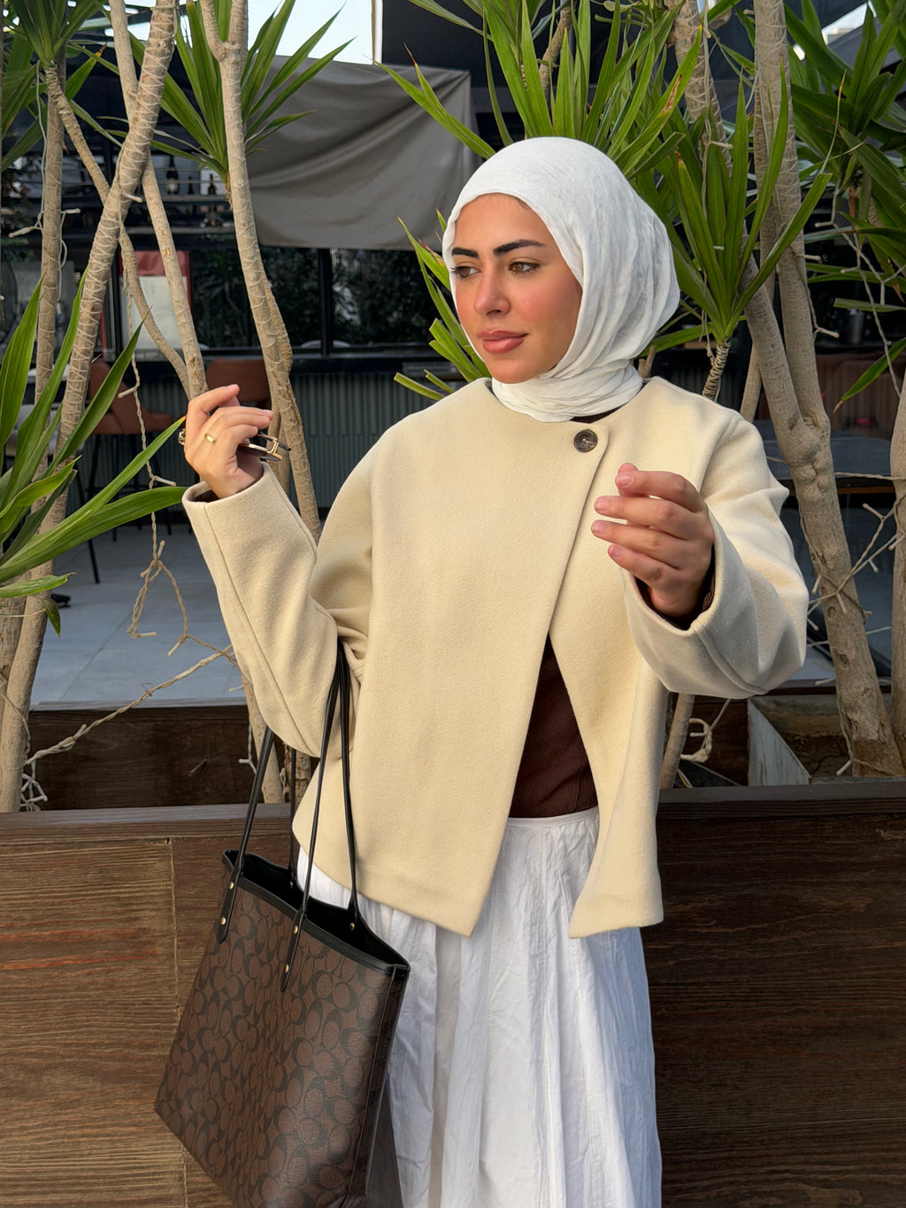 the beige side button jacket