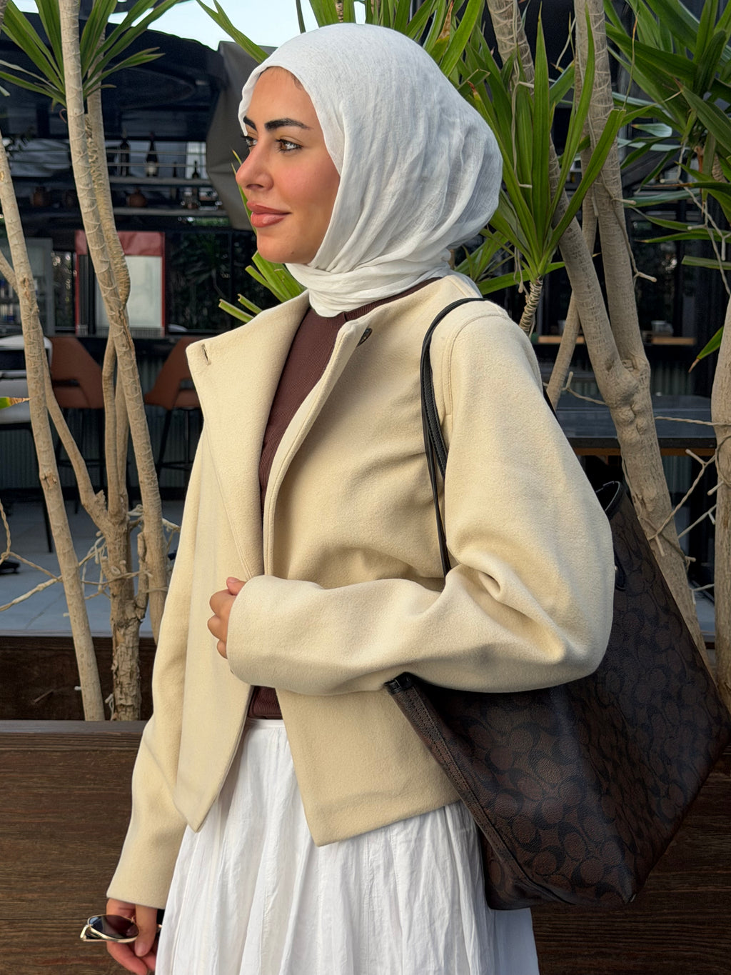 the beige side button jacket